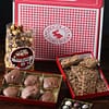 Gingham Classic Chocolate Trunk with pecan turtles, popcorn, truffles and English toffee displayed in open boxes
