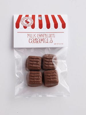 4 milk chocolate covered caramels in a bag